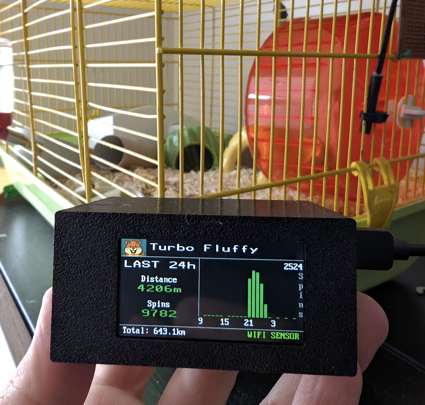Collidera sensor attached to hamster wheel and cage